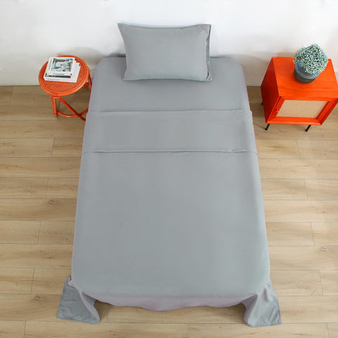 Bedecor fitted sheet beside a tape measure showing 24-inch depth to confirm correct mattress fit