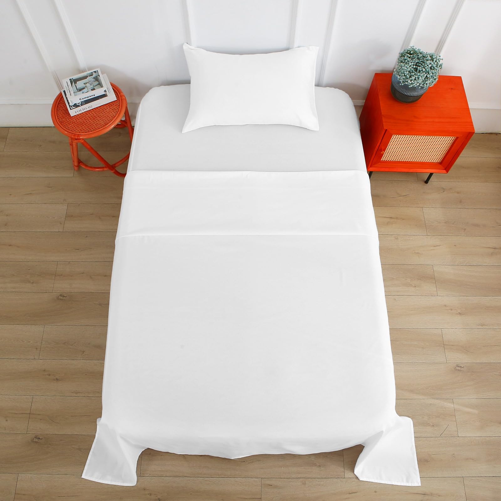 Bedecor fitted sheet beside measuring tape showing 24-inch pocket depth benefit