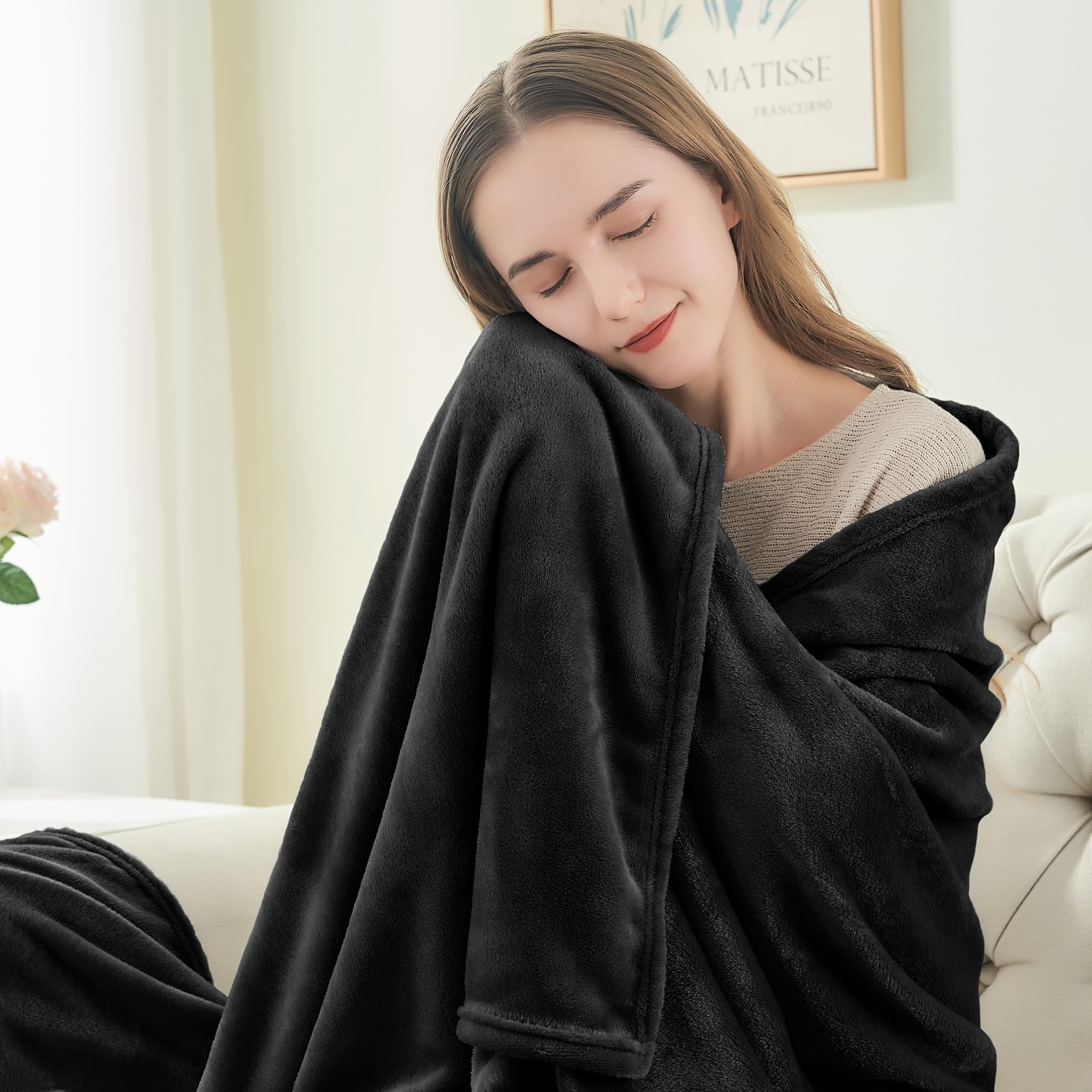BEDELITE folded blanket in neat stack showing compact storage and portability