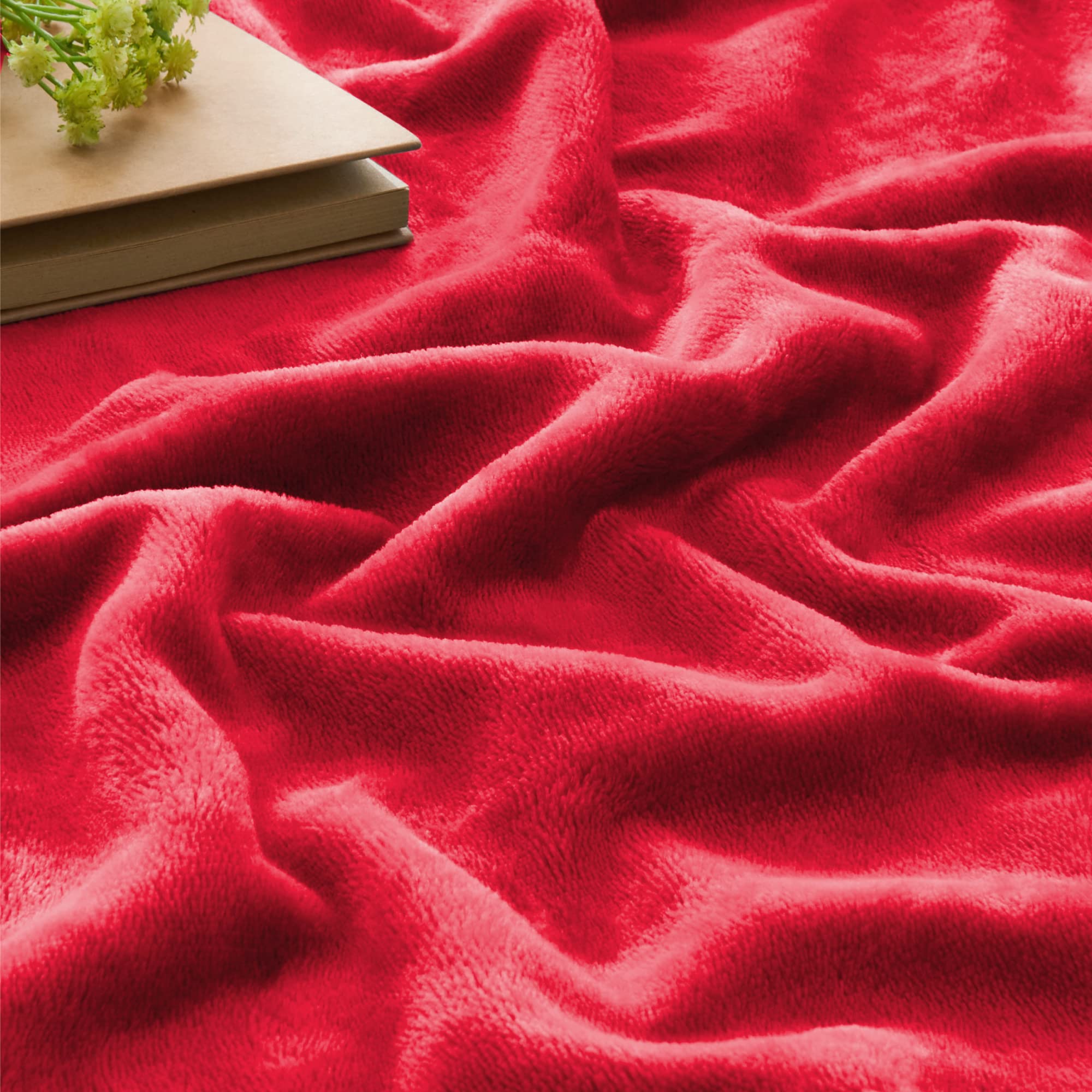 BEDELITE blanket draped on king bed adding color and protection