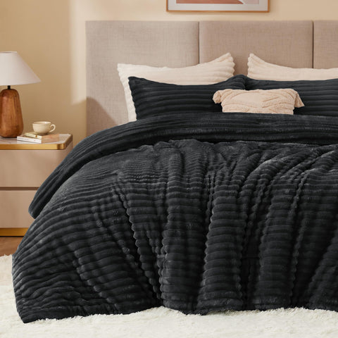 BEDELITE front view of black comforter set showing plush striped texture and stylish look
