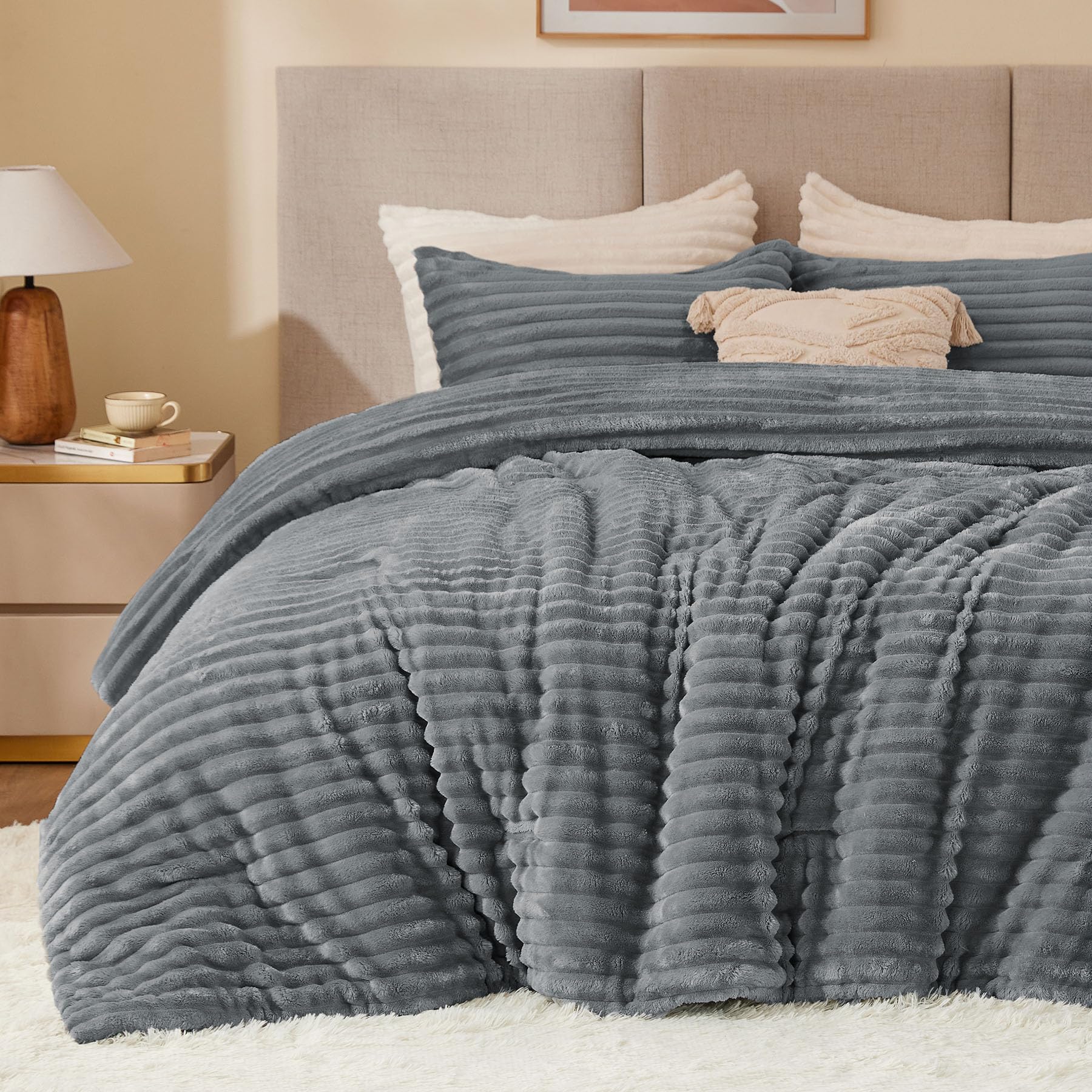 BEDELITE front view of grey comforter showing plush surface and elegant stripes for cozy style