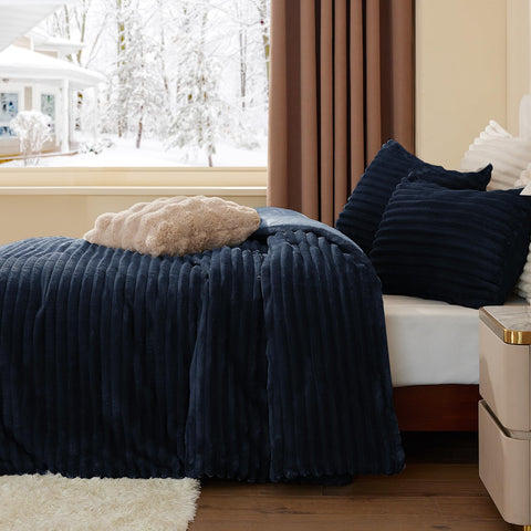 BEDELITE comforter styled on a bed in a bedroom setting for inviting ambiance