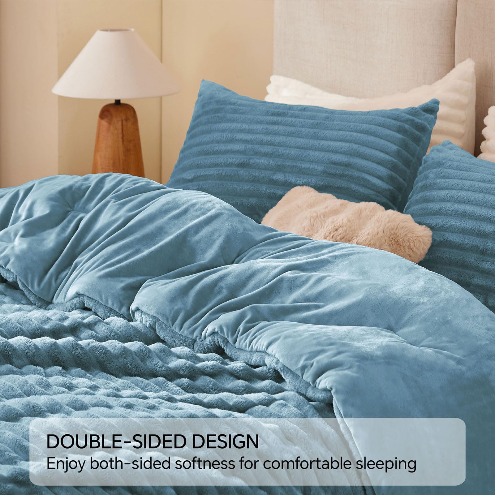 BEDELITE on styled king bed showing elegant blue fog décor and cozy look
