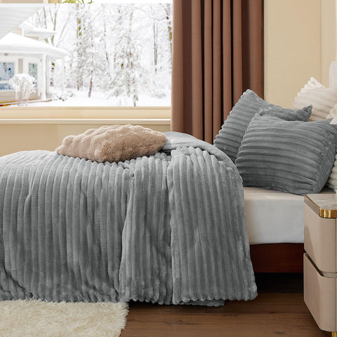 BEDELITE comforter styled on a twin bed demonstrating cozy bedroom appeal