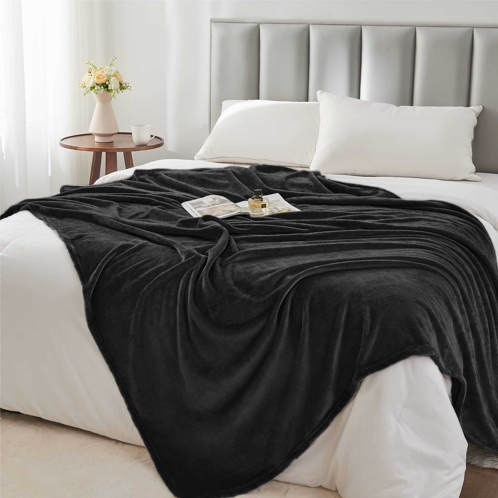 BEDELITE draped over couch to protect upholstery and enhance living room decor