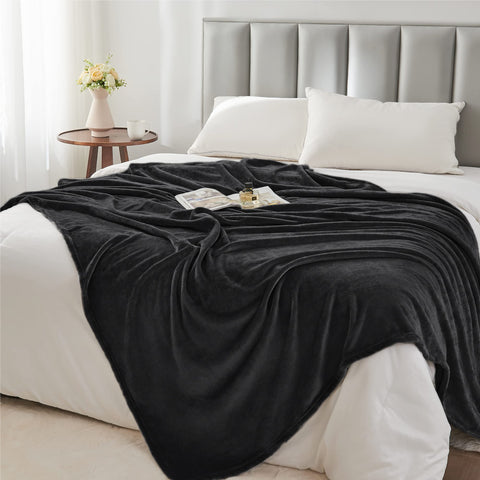BEDELITE draped over couch to protect upholstery and enhance living room decor