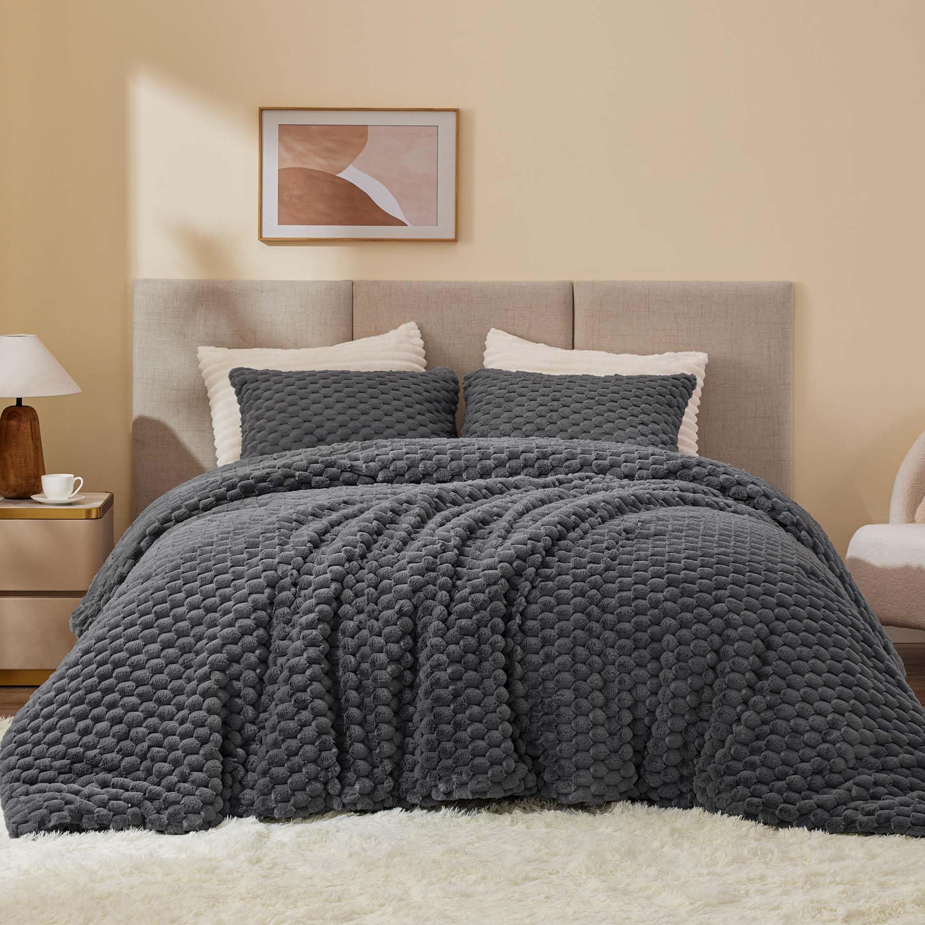 BEDELITE folded comforter stacked tidy for storage demonstrating space saving