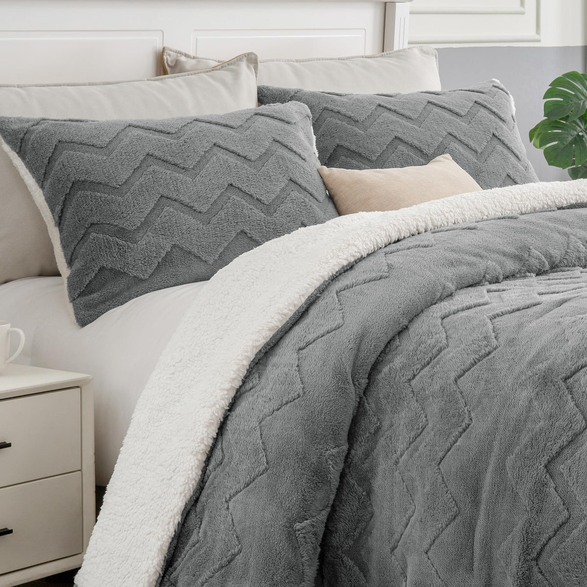 BEDELITE front view of grey king comforter showing plush finish and tailored look