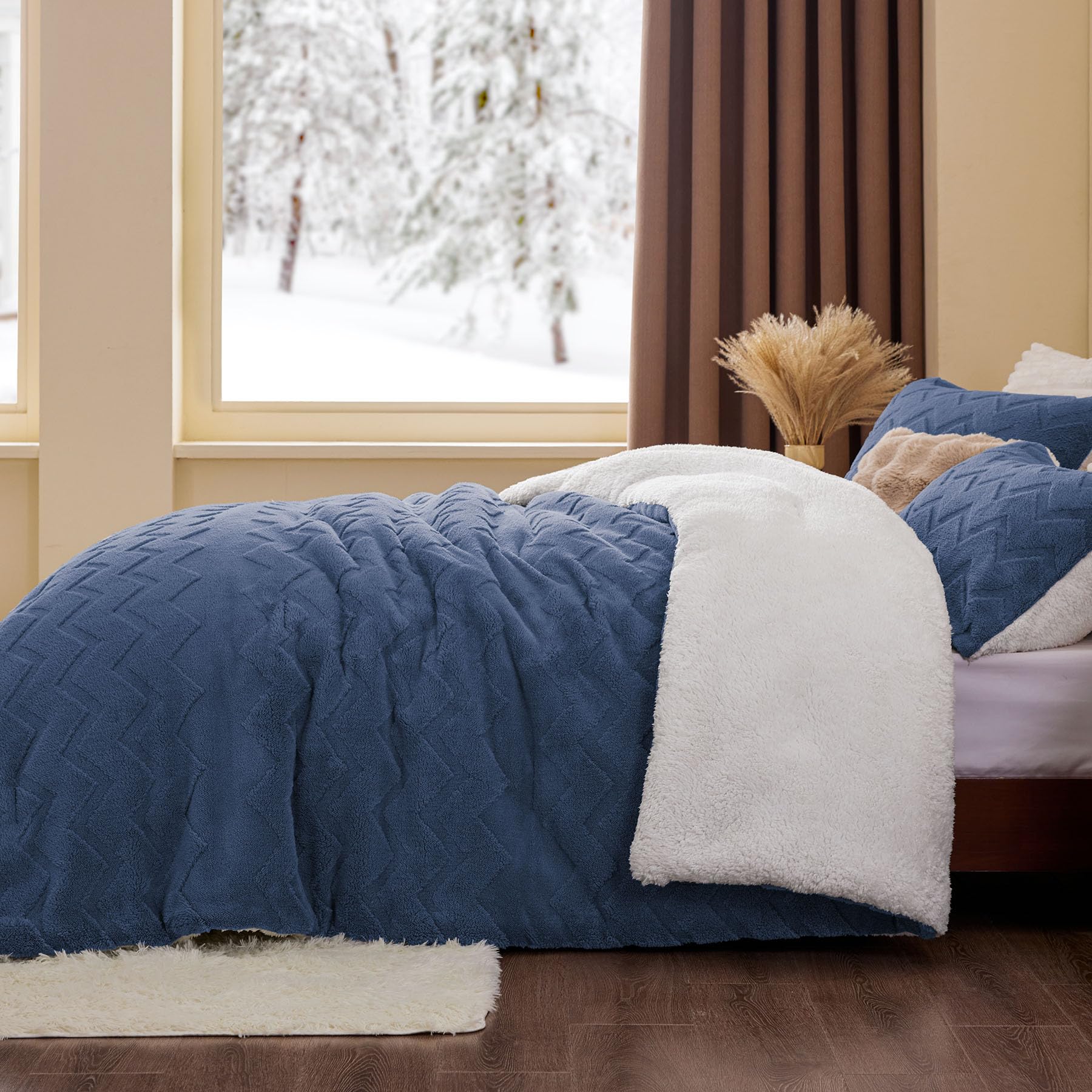 BEDELITE lifestyle bedroom styling with comforter creating a calm navy focal point