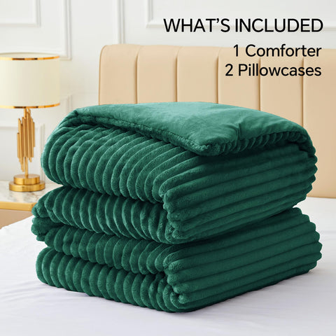 BEDELITE styled bedroom showing dark green comforter enhancing room warmth