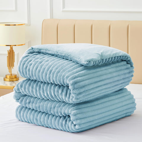 BEDELITE comforter on full bed for scale, illustrating generous coverage and drape