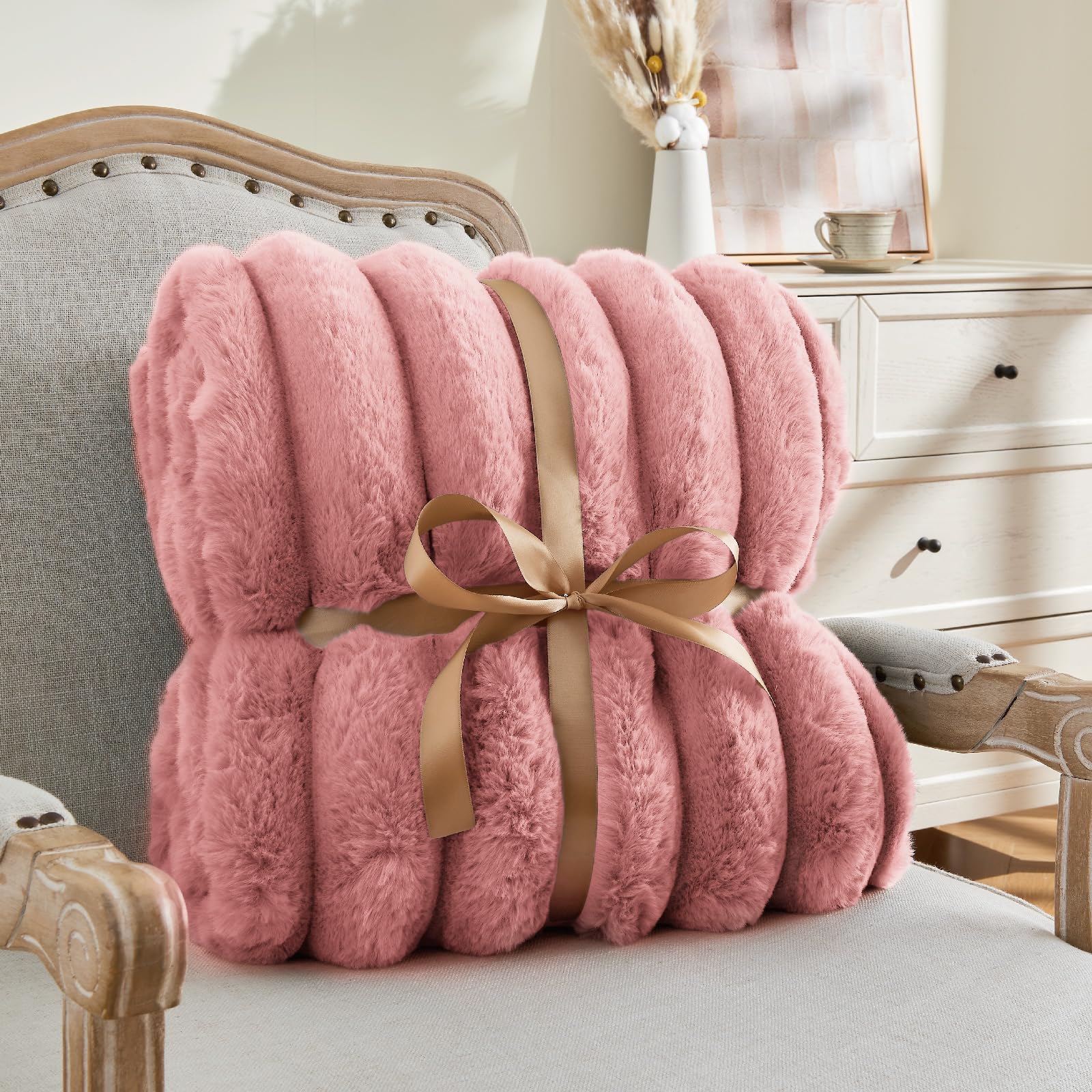 BEDELITE throw spread on bed creating a layered, inviting look
