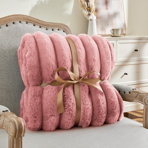 BEDELITE throw spread on bed creating a layered, inviting look