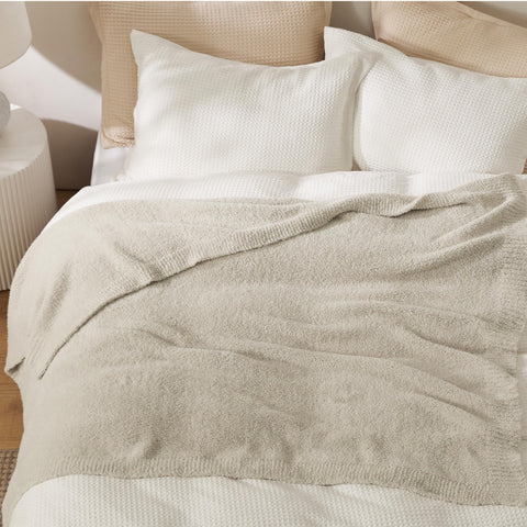 Bedsure spread across bed showing coverage and breathable comfort for layering