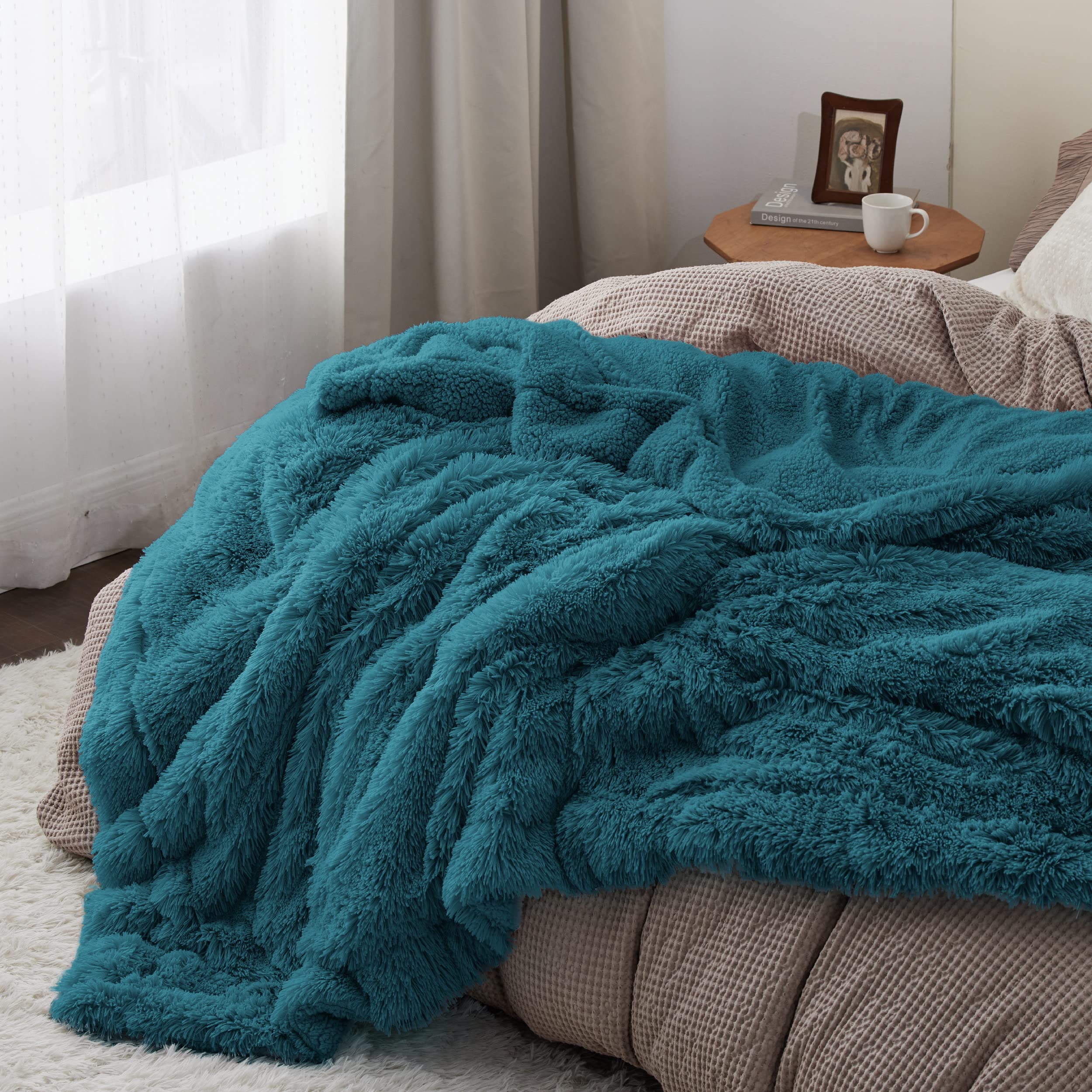 Bedsure blanket draped on bed adding teal decor and comfortable look