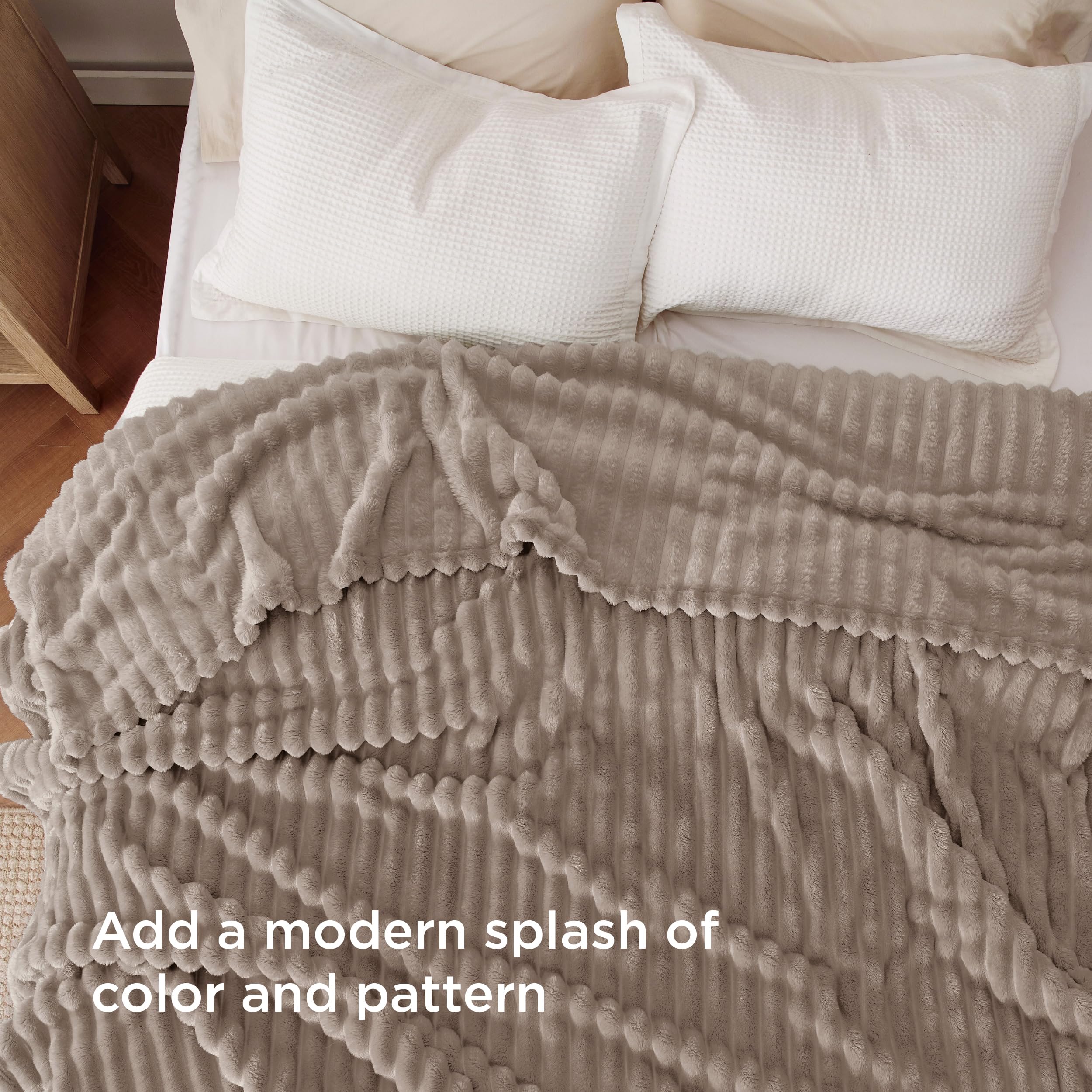 Bedsure blanket draped on king bed shows generous size and warmth
