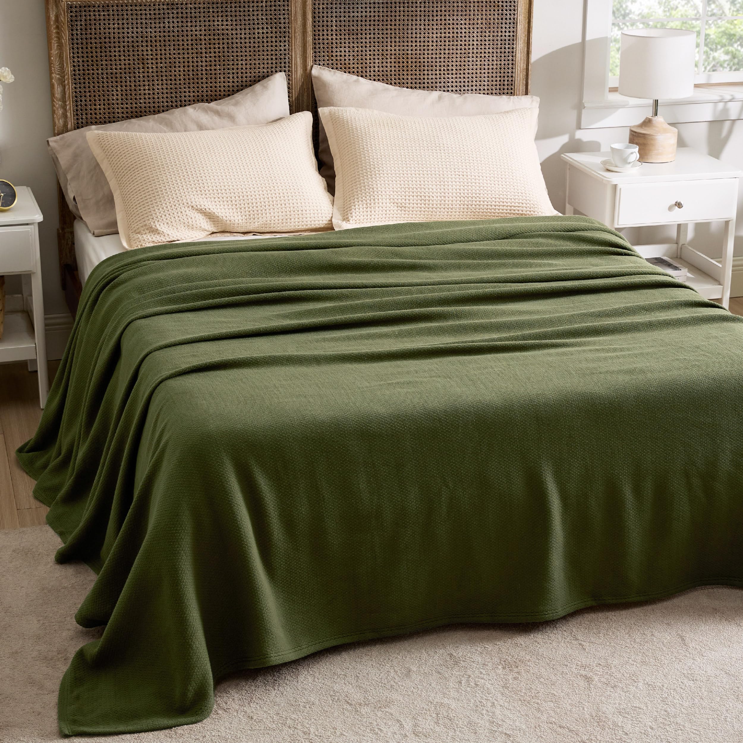 Bedsure blanket draped over sofa in living room offering layered warmth