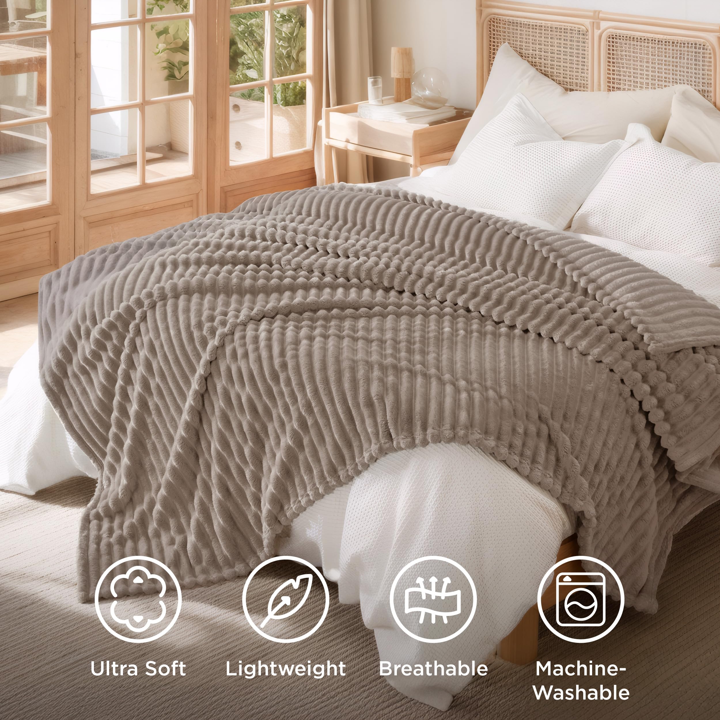 Bedsure folded blanket next to pillow shows 108x90 size scale