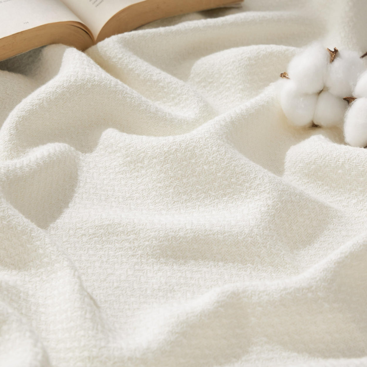 Bedsure blanket front view in cream showing full queen coverage and elegant look