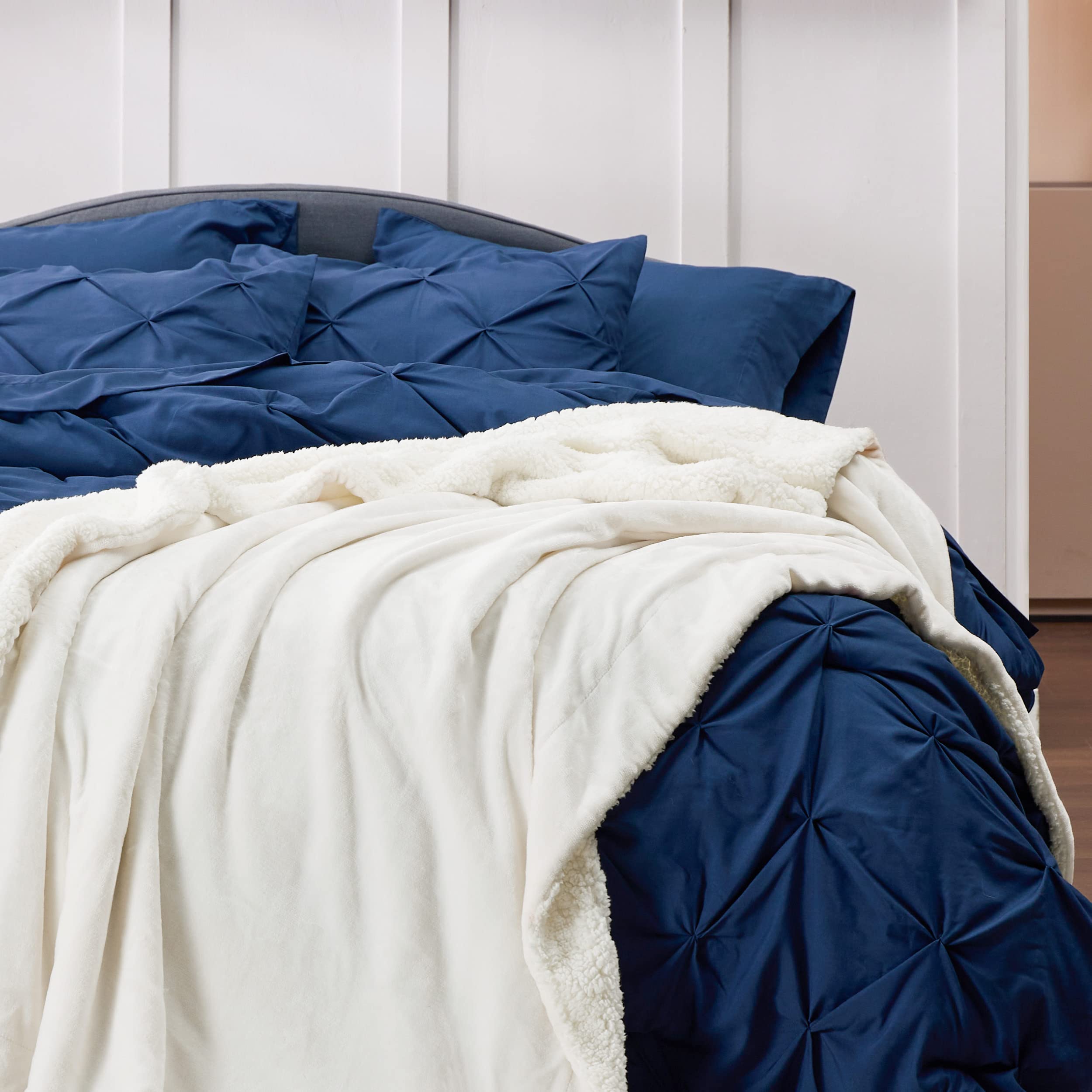Bedsure blanket draped on couch for cozy living room appeal
