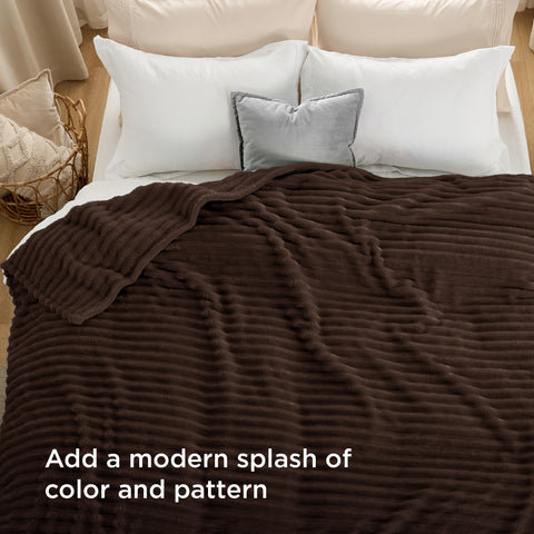 Bedsure blanket on king bed staged in bedroom suggests cozy styling