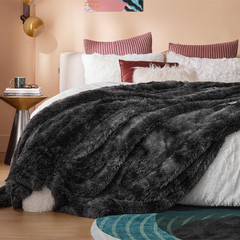 Bedsure blanket draped on sofa shows stylish living room benefit