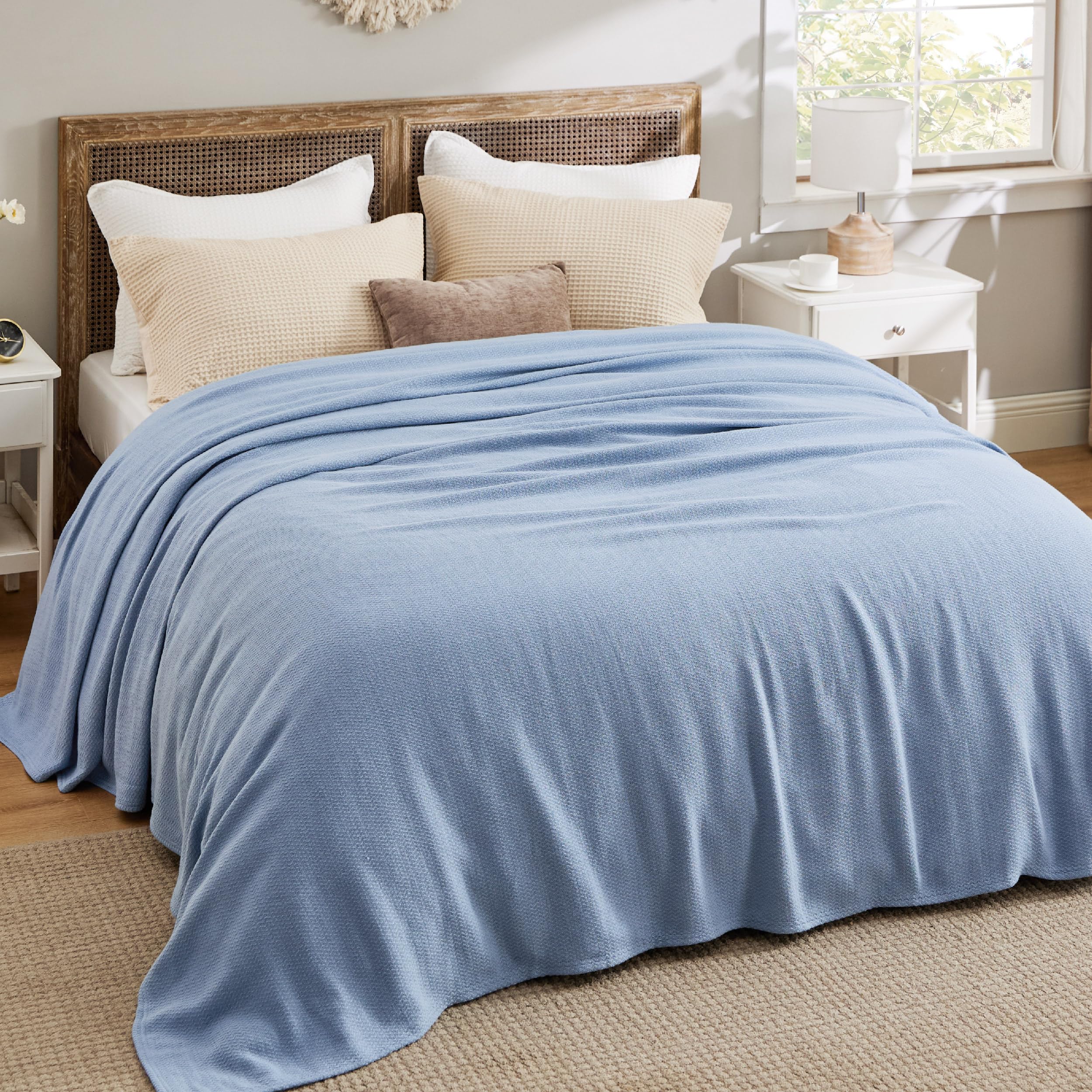 Bedsure blanket on sofa in living room offering cozy decor benefit