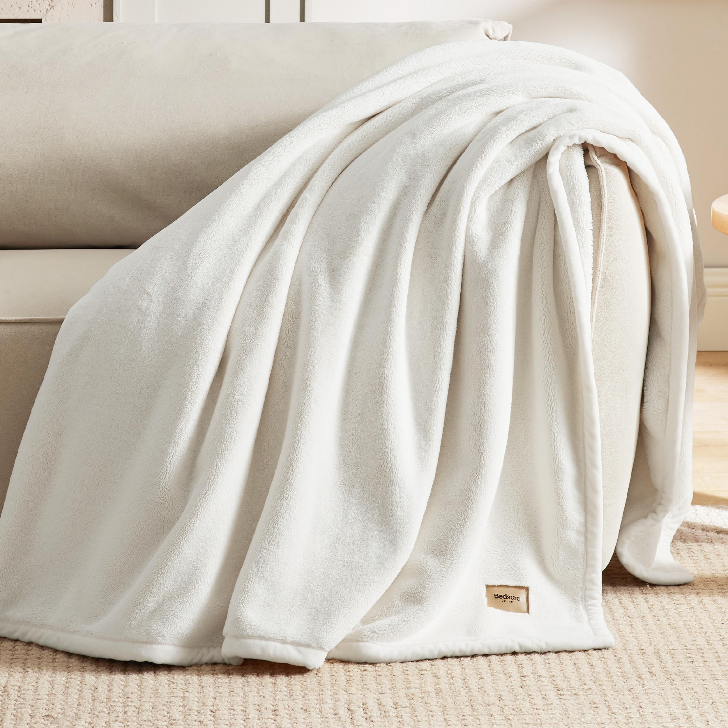 Bedsure person wrapped in blanket showing cozy comfort