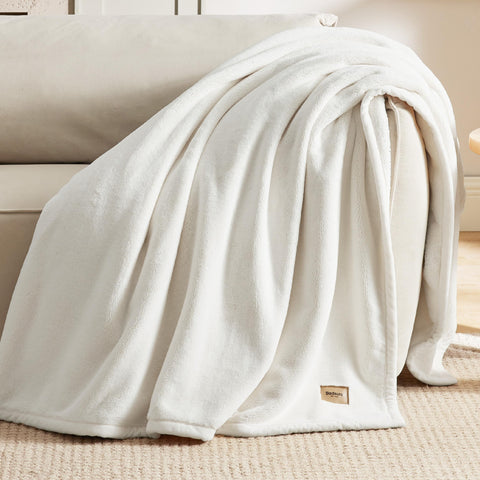 Bedsure person wrapped in blanket showing cozy comfort