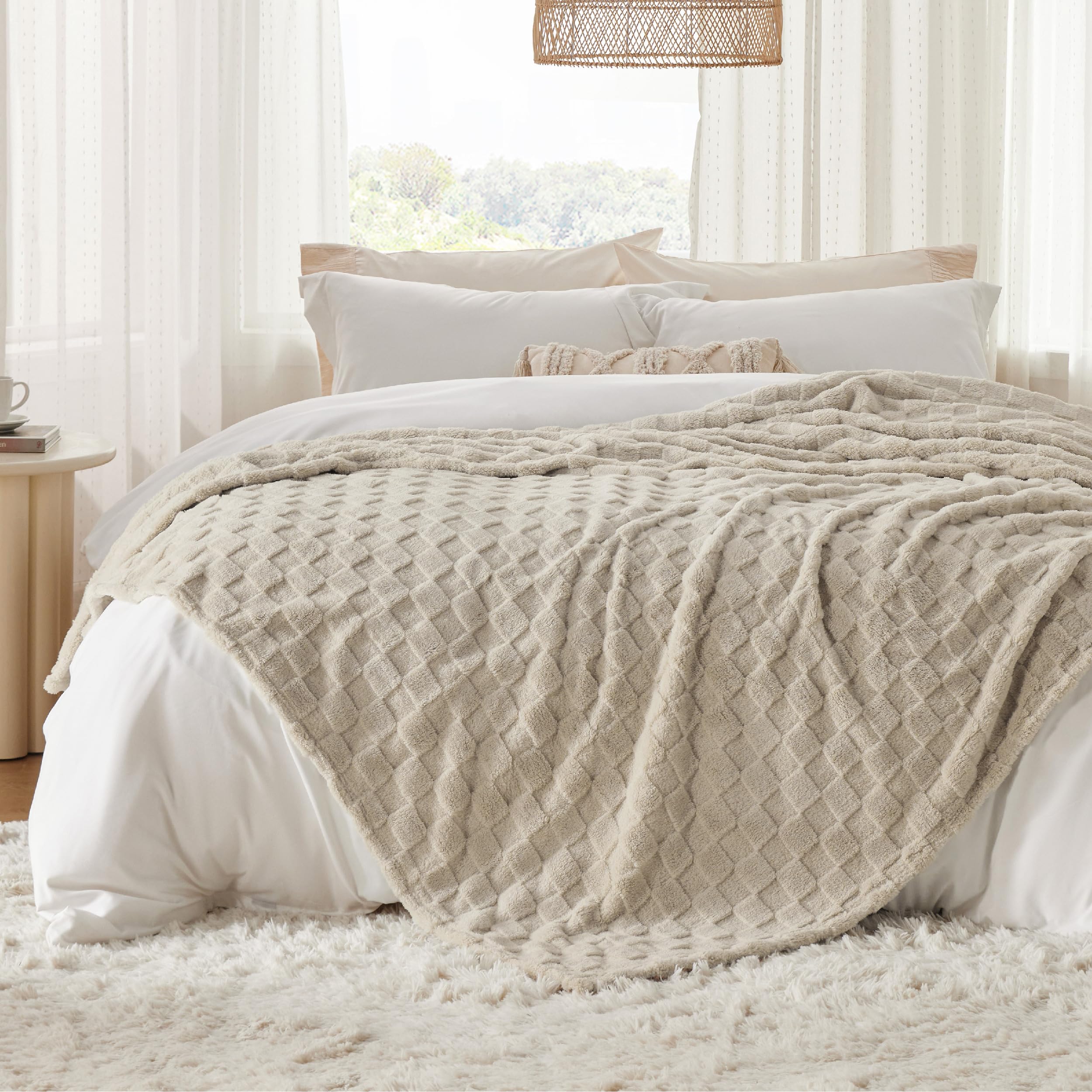 Bedsure blanket on a queen bed showing generous 90×90 coverage for sharing