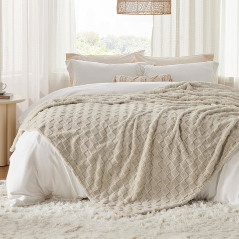 Bedsure blanket on a queen bed showing generous 90×90 coverage for sharing