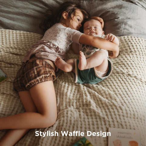 Hand touching Bedsure blanket texture to show lightweight comfort and gentle feel
