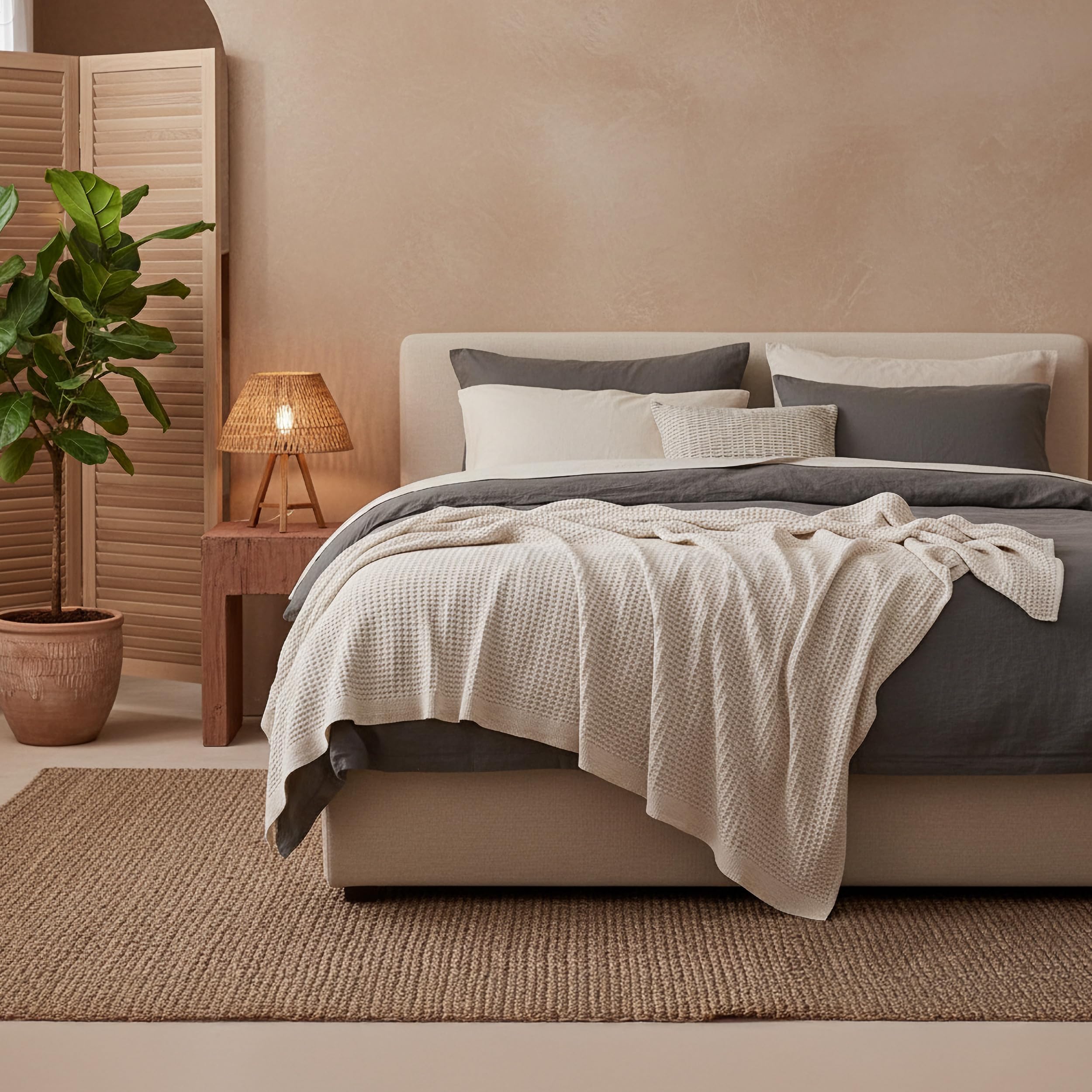Bedsure hand touching waffle texture conveying soft, breathable comfort