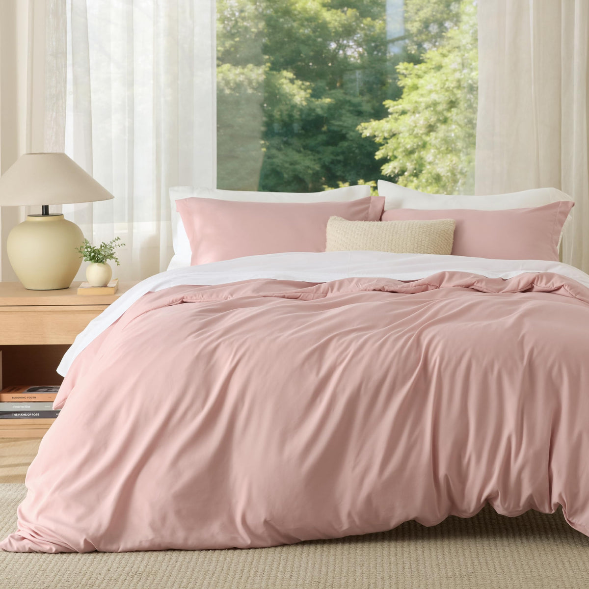 Bedsure blush pink front view showing soft minimalist bedding and neat fit