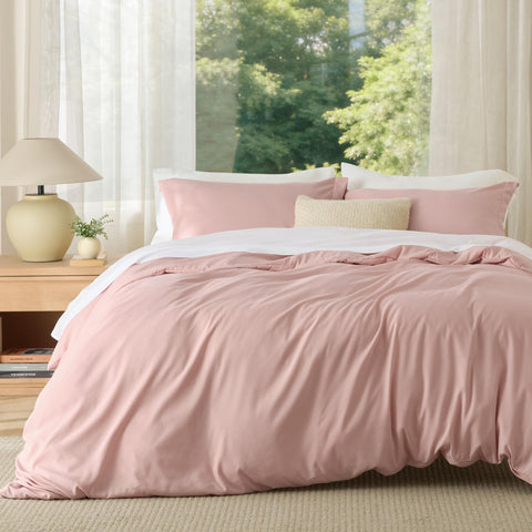 Bedsure blush pink front view showing soft minimalist bedding and neat fit