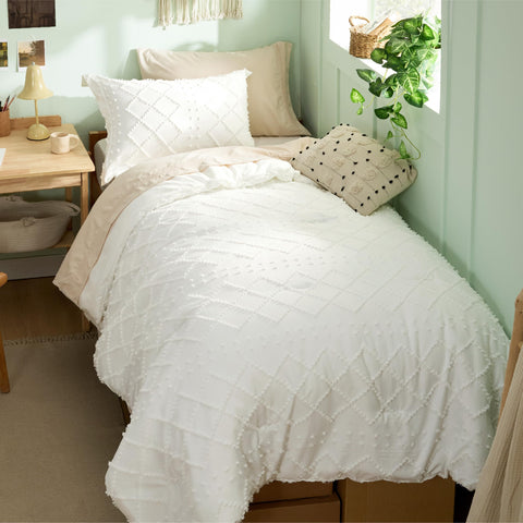 Bedsure comforter front view showing tufted design and calming ivory tone for cozy styling