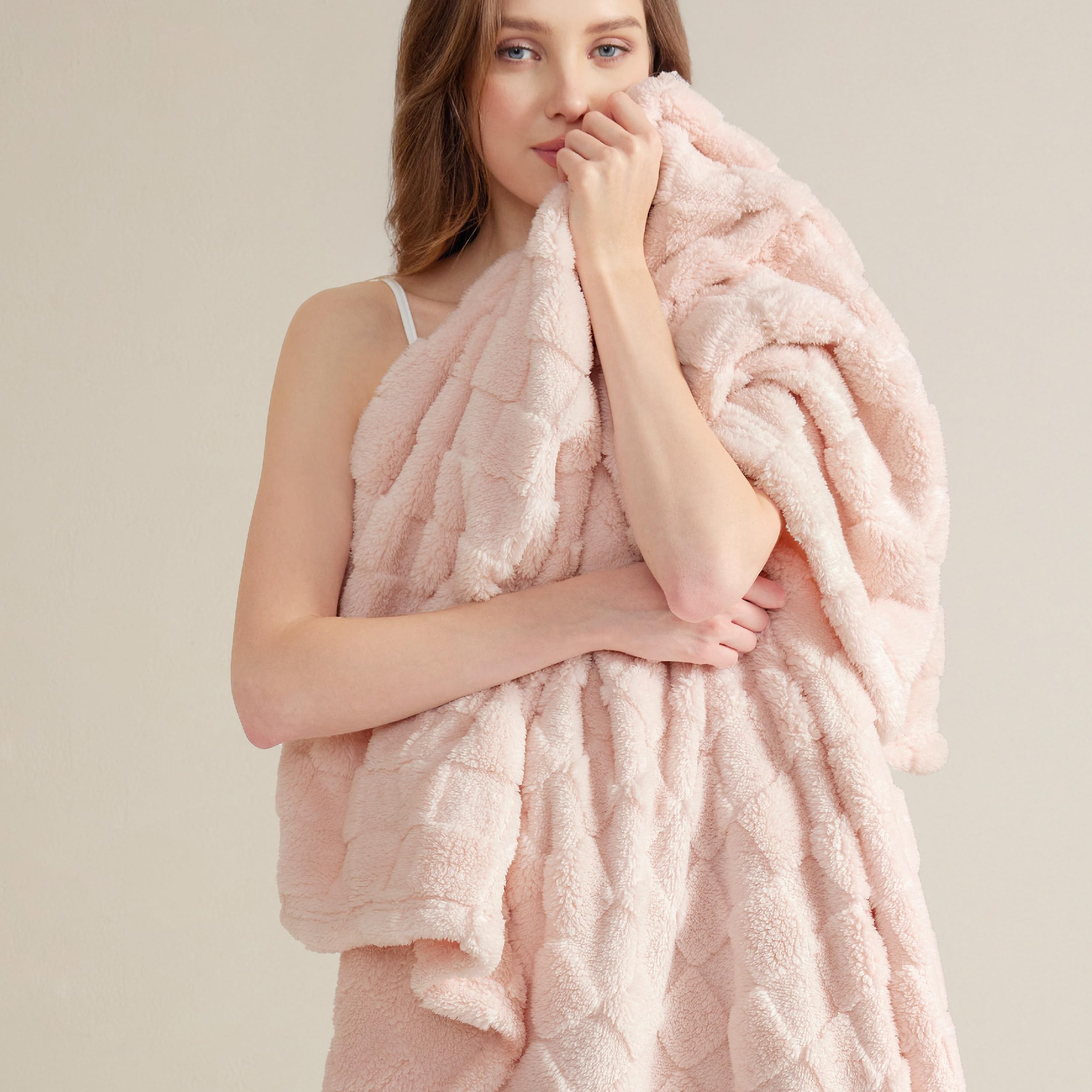 Bedsure front view of light pink checkered blanket showing pattern and drape for cozy styling