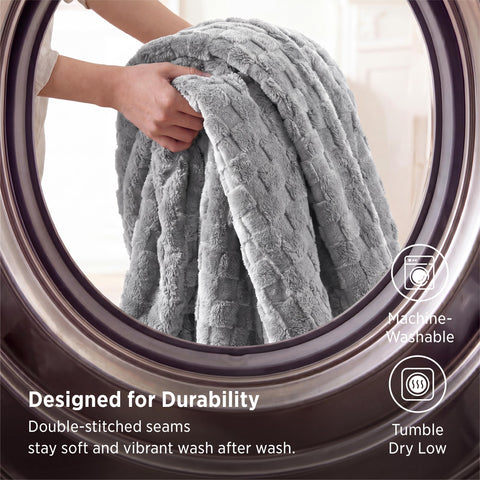 Bedsure blanket draped over lap while reading showing comfort in use