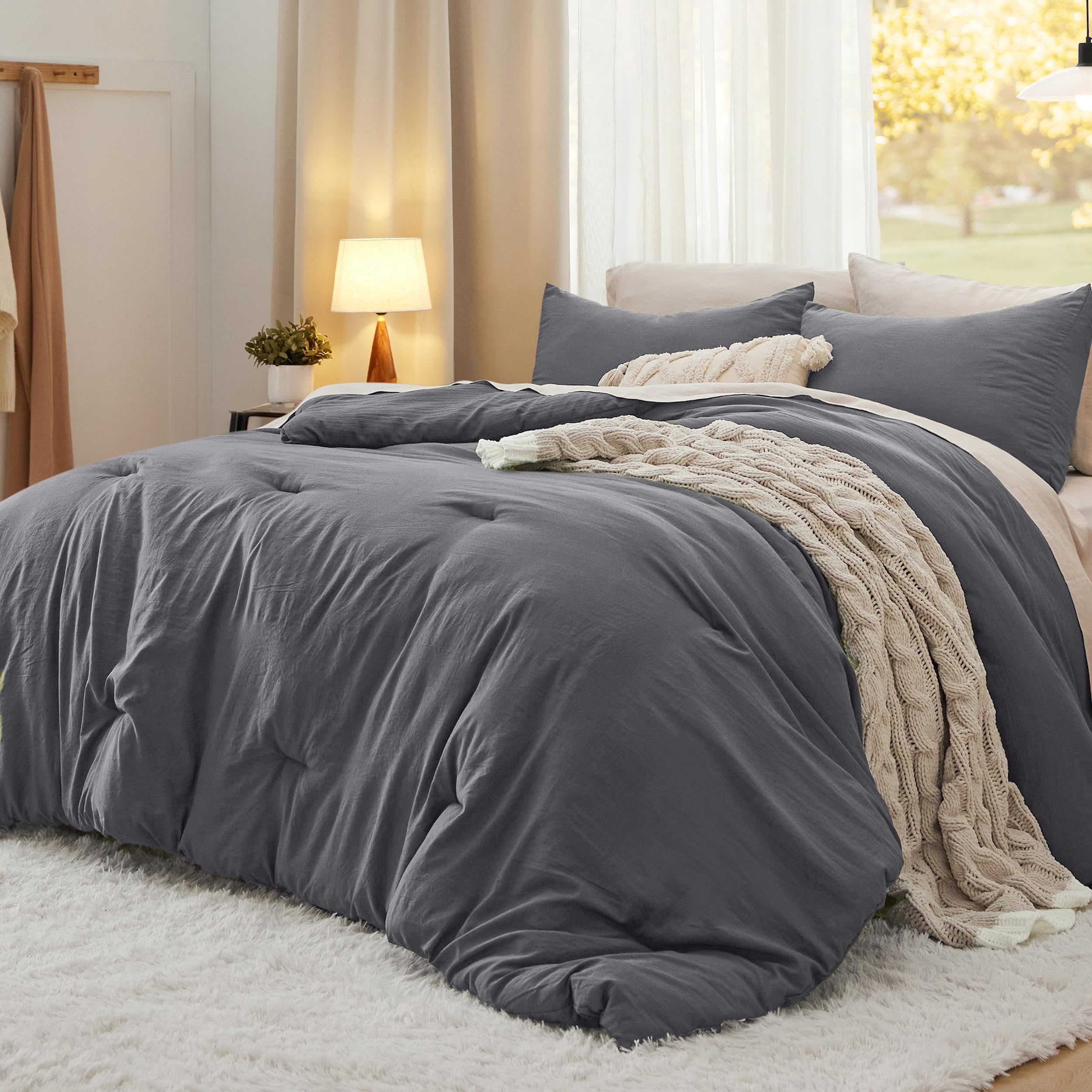 Bedsure front view showing dark grey oversized comforter for full coverage and style