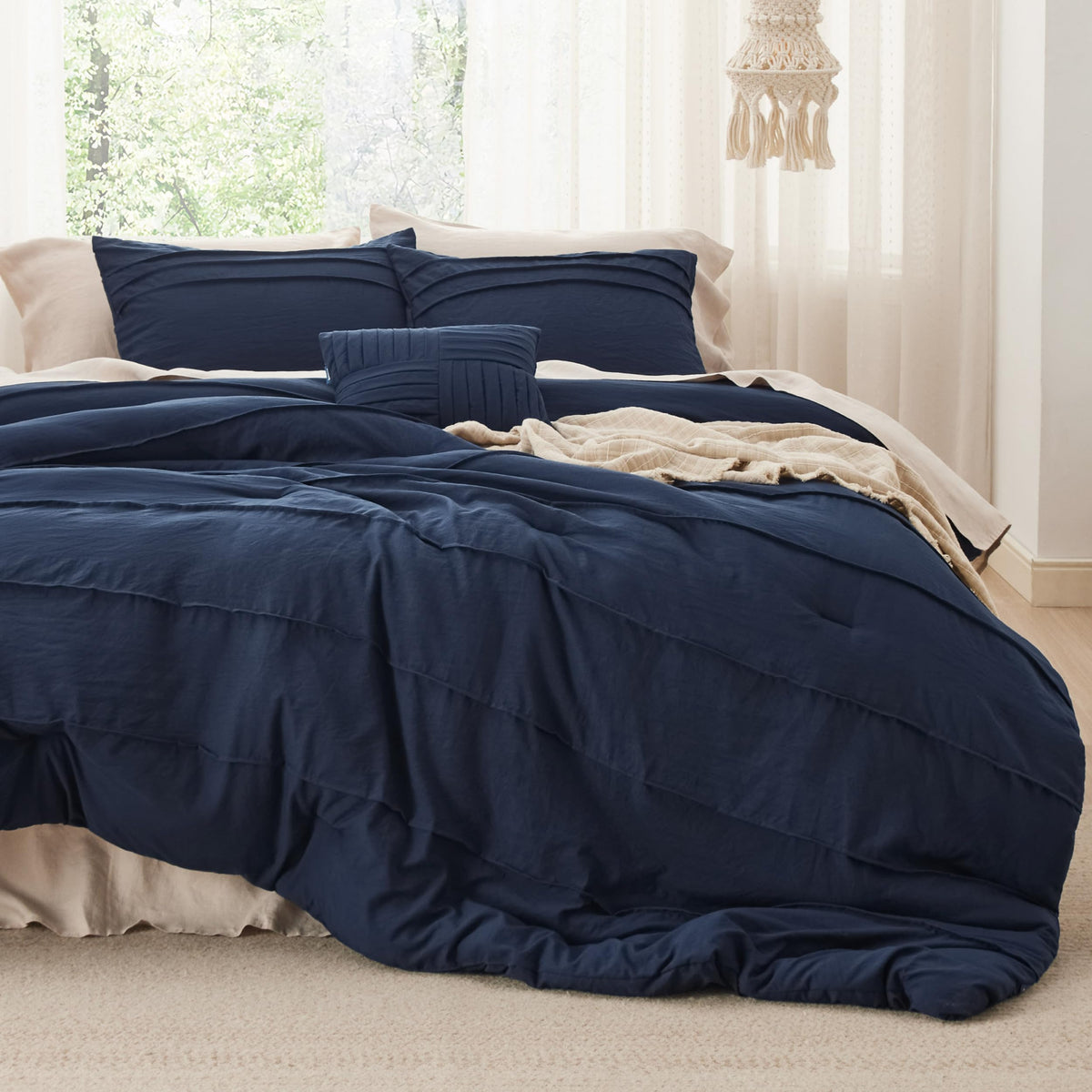 Bedsure comforter front view in navy showing neat pinch pleat and cozy look