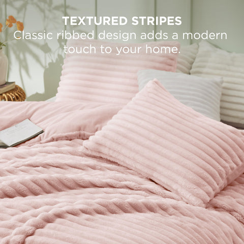Bedsure comforter draped on full bed showing generous hang and room coverage