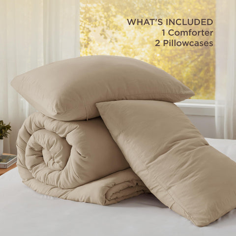 Bedsure comforter next to mattress showing 120x98 oversized fit and generous overhang
