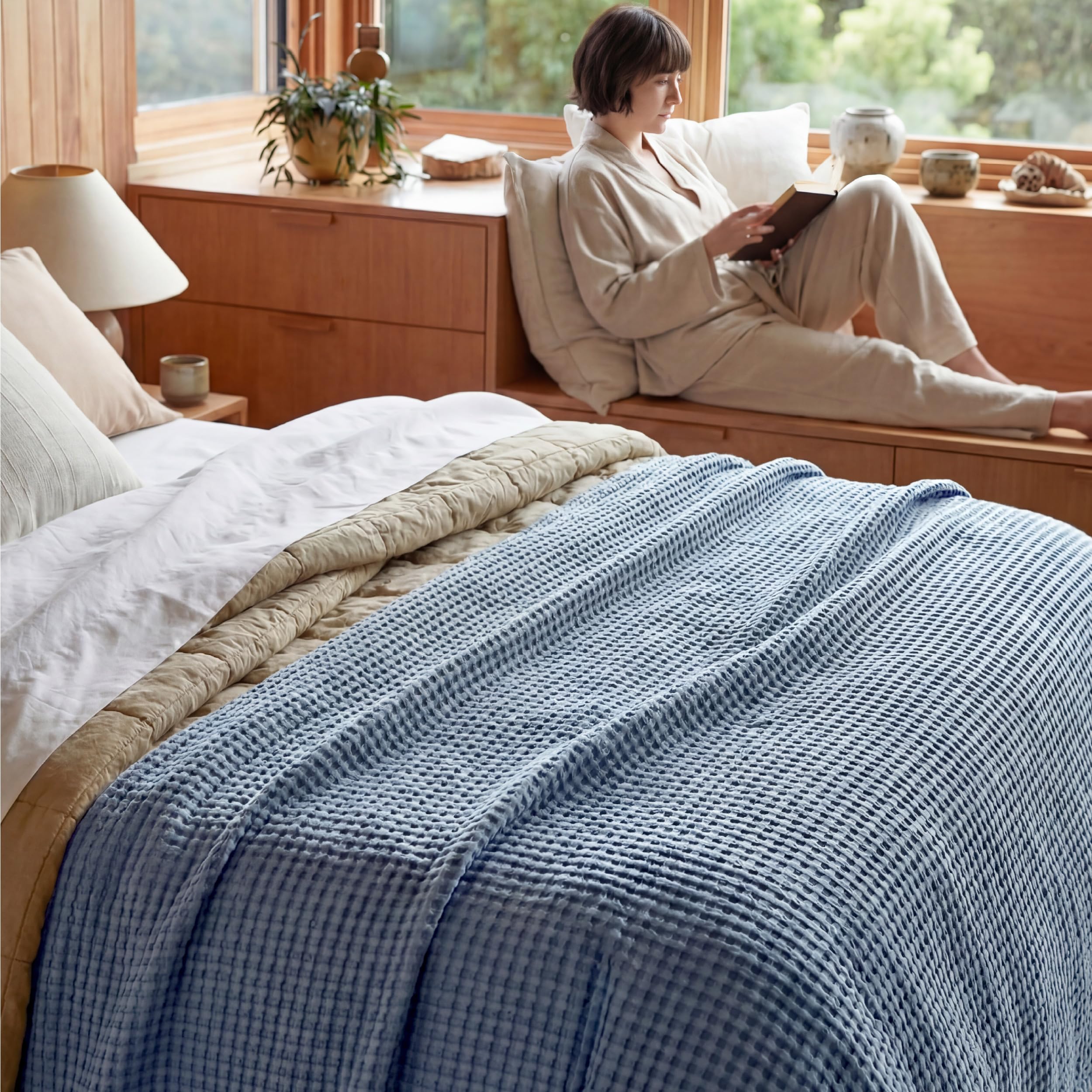 Bedsure draped in hands showing lightweight drape benefit: easy to handle