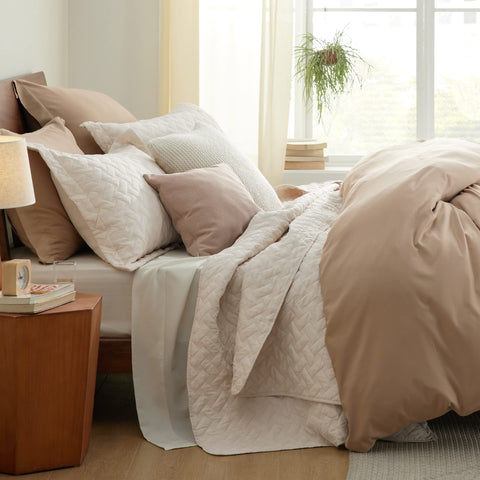 Bedsure draped quilt across king bed showing generous overhang
