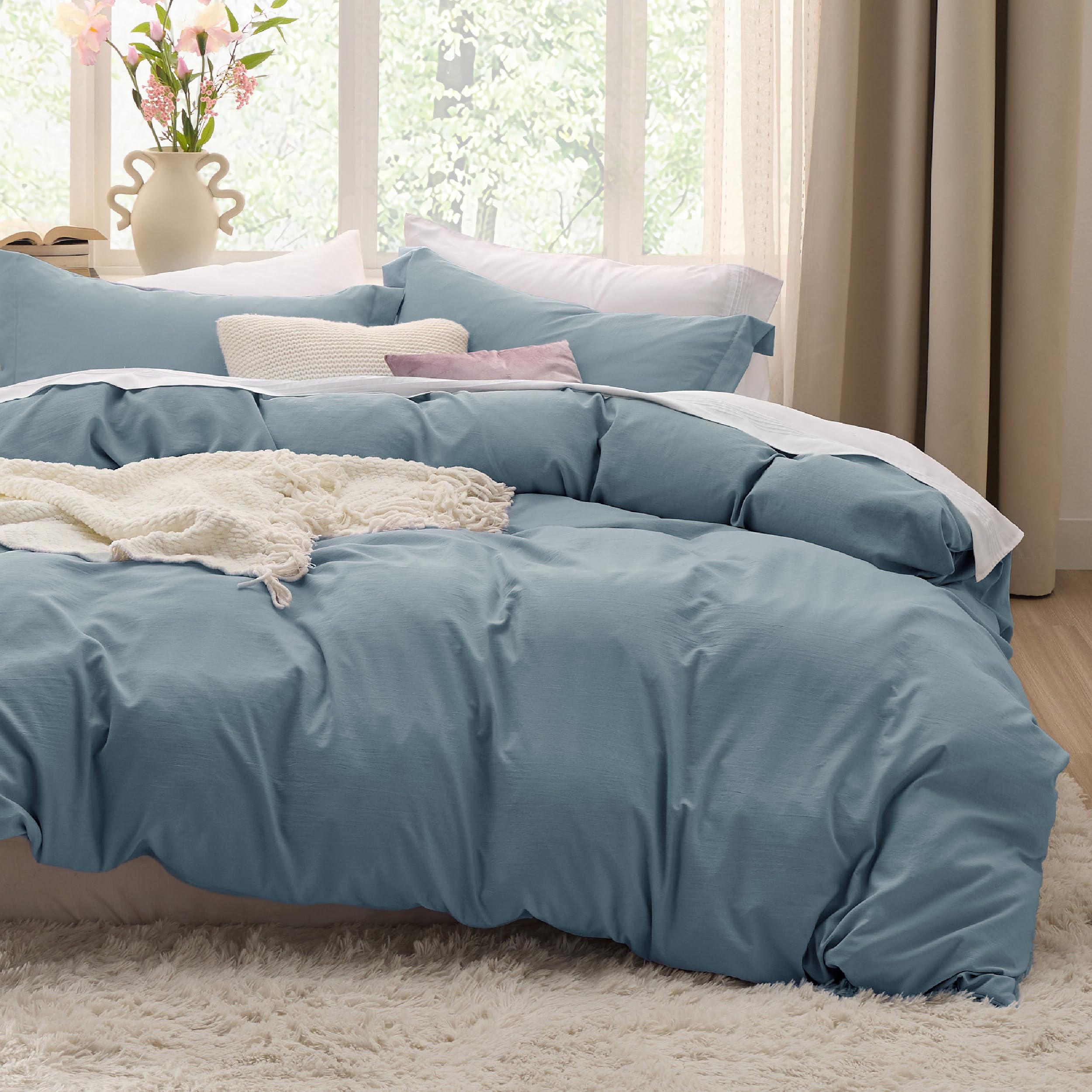 Bedsure duvet cover front view showing dusty blue and neat finish benefits softness