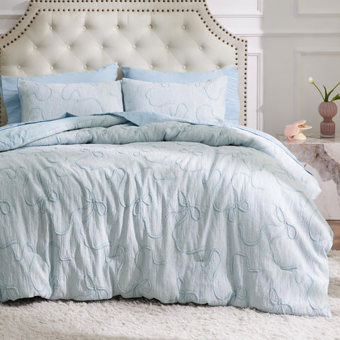 Bedsure dusty blue front view showing full comforter and neat drape for polished look