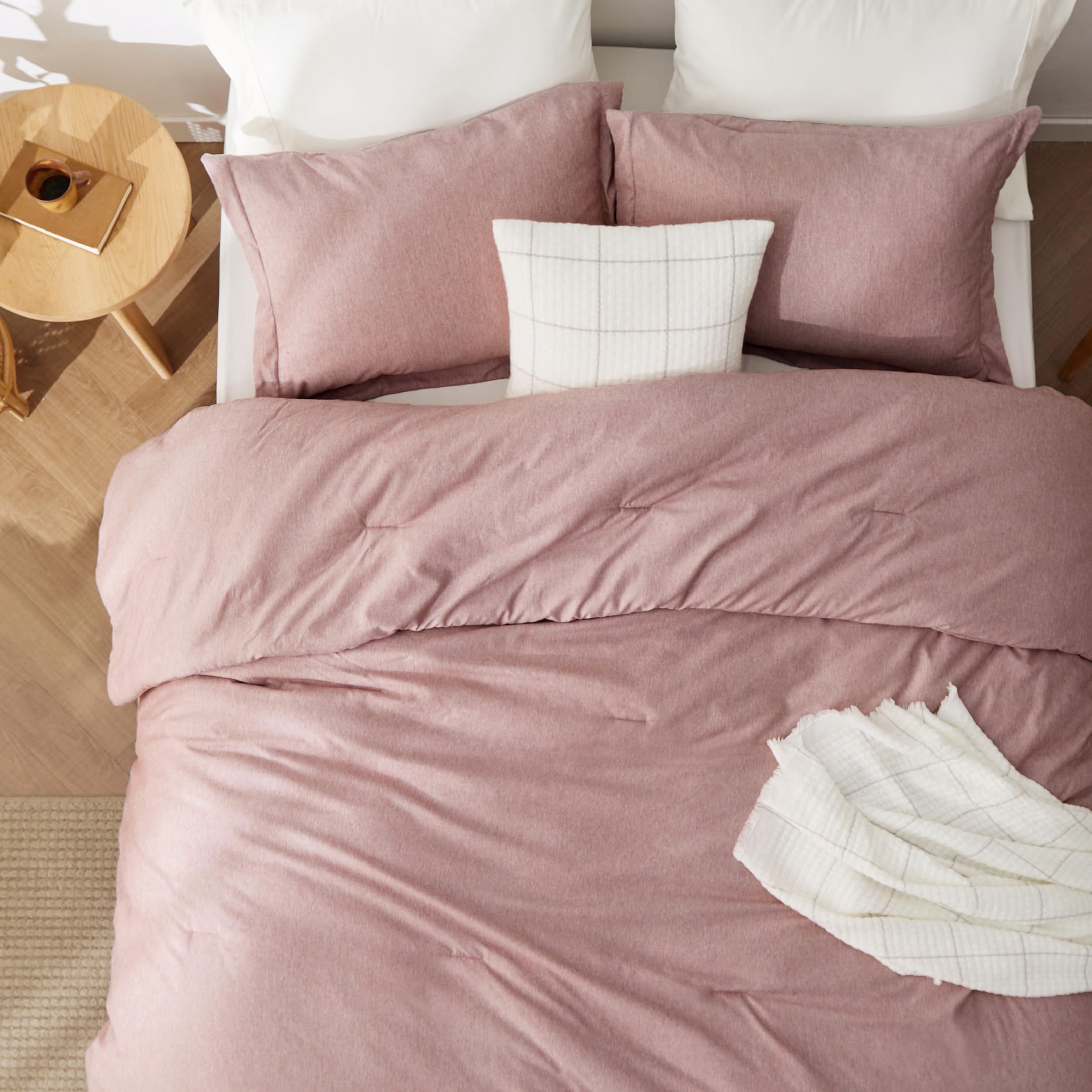 Bedsure dusty pink folded for storage shows compact, easy-care convenience