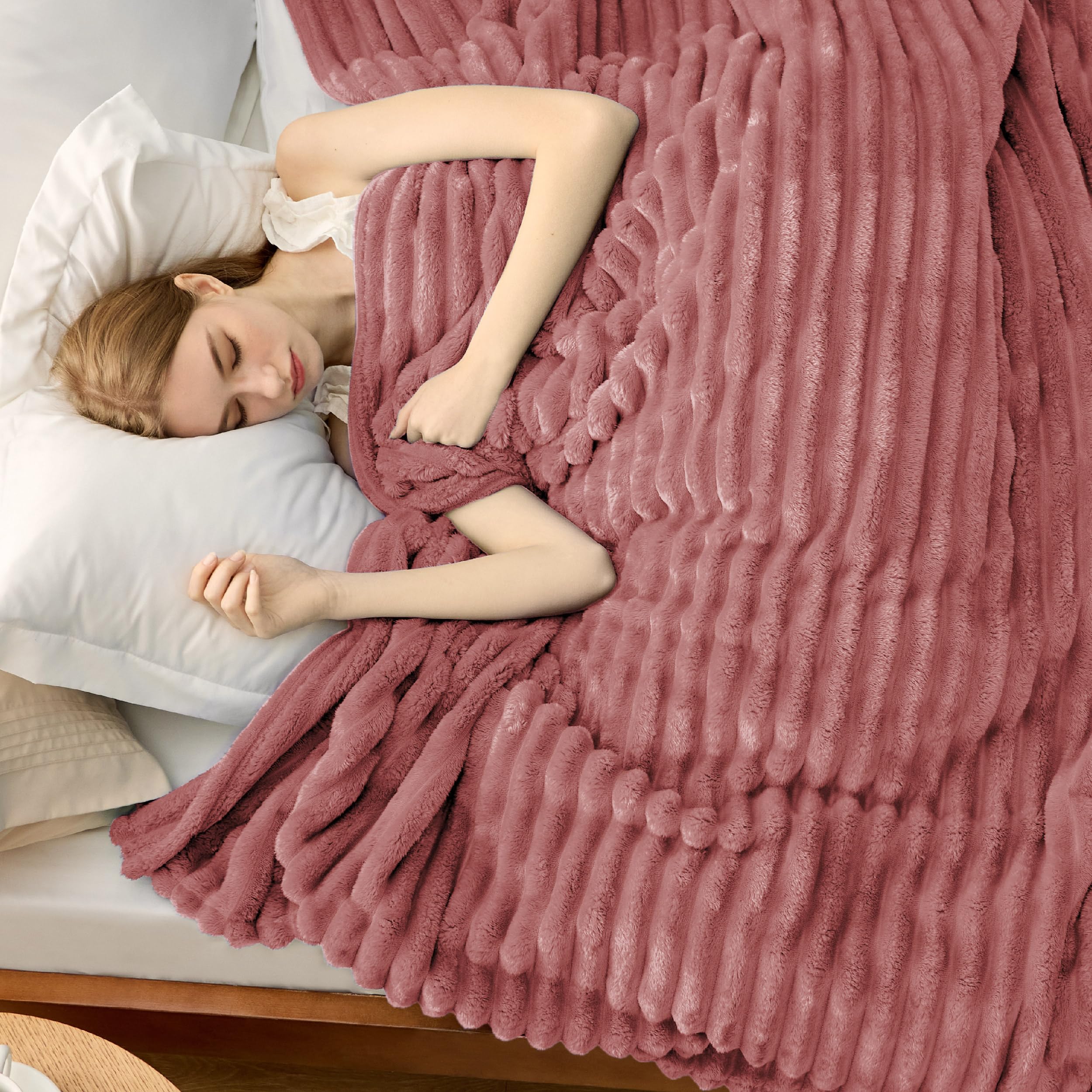 Bedsure dusty pink neatly folded stack highlighting portability and neat storage