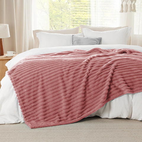 Bedsure dusty pink spread on queen bed for full coverage and layered look